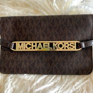 Michael Korrs waist wallet logo